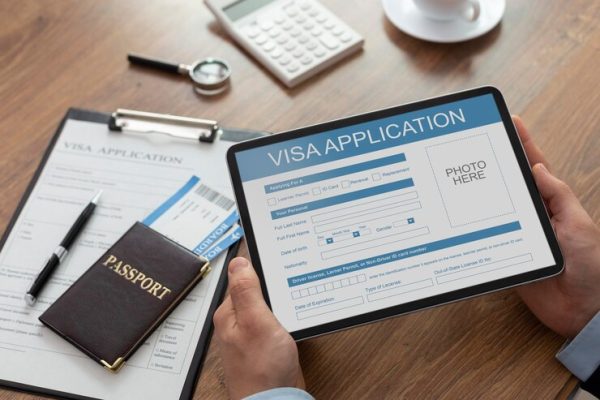 visa-application-form-tablet_23-2149117762 visa-application-form-tablet_23-2149117762